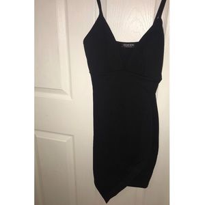 Mini black dress with crop design.